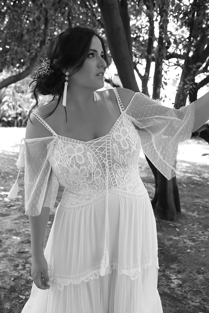 Agata by studio levana plus size boho style wedding dress with sort boho sleeves and a layerd lace tulle and shiffon skirt