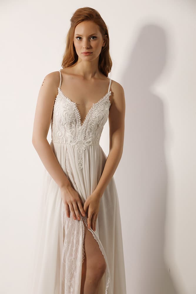 Parpar by studio levana fasion forwoed wedding dress with peals and lace gental peals on the straps and nude and ivory skirt