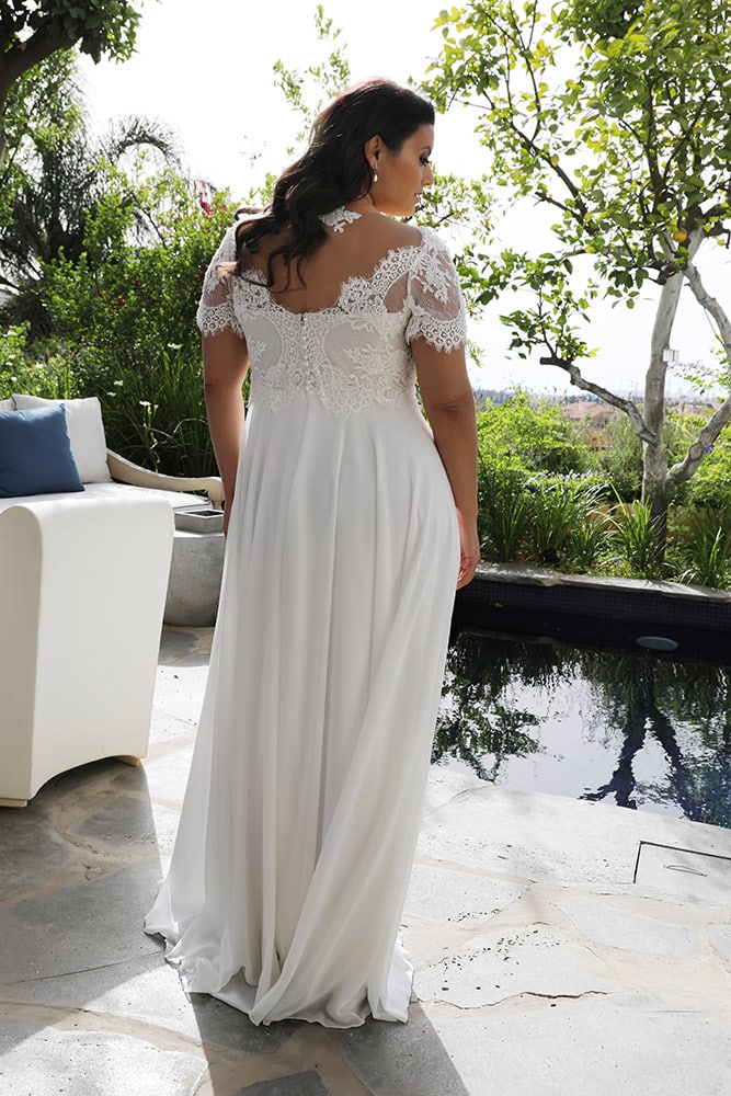 Scarlet by studio levana plus size baeded romantic lace wedding dress with short sleeves and an A line skirt