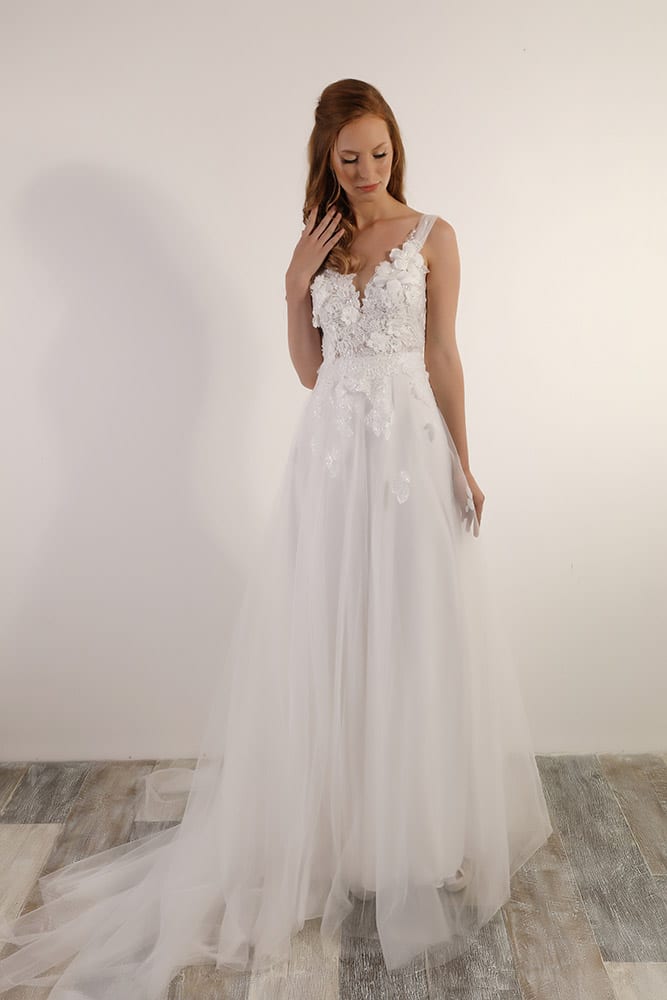 Yael by studio levana princess chic wedding dress with 3D floral lace and a tulle skirt