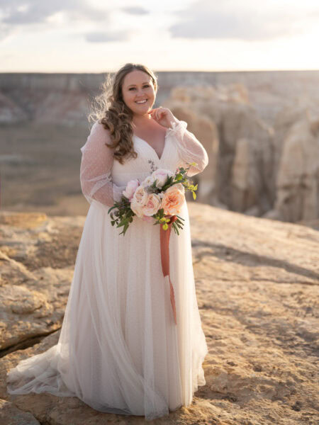 Bride wearing Tair gown by Studio Levana in Arizona canyon elopement