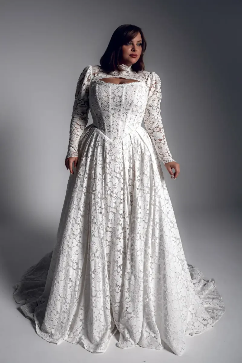 Studio Levana Claire plus size lace A-line wedding dress with floral lace and long lace sleeves, full-length front view
